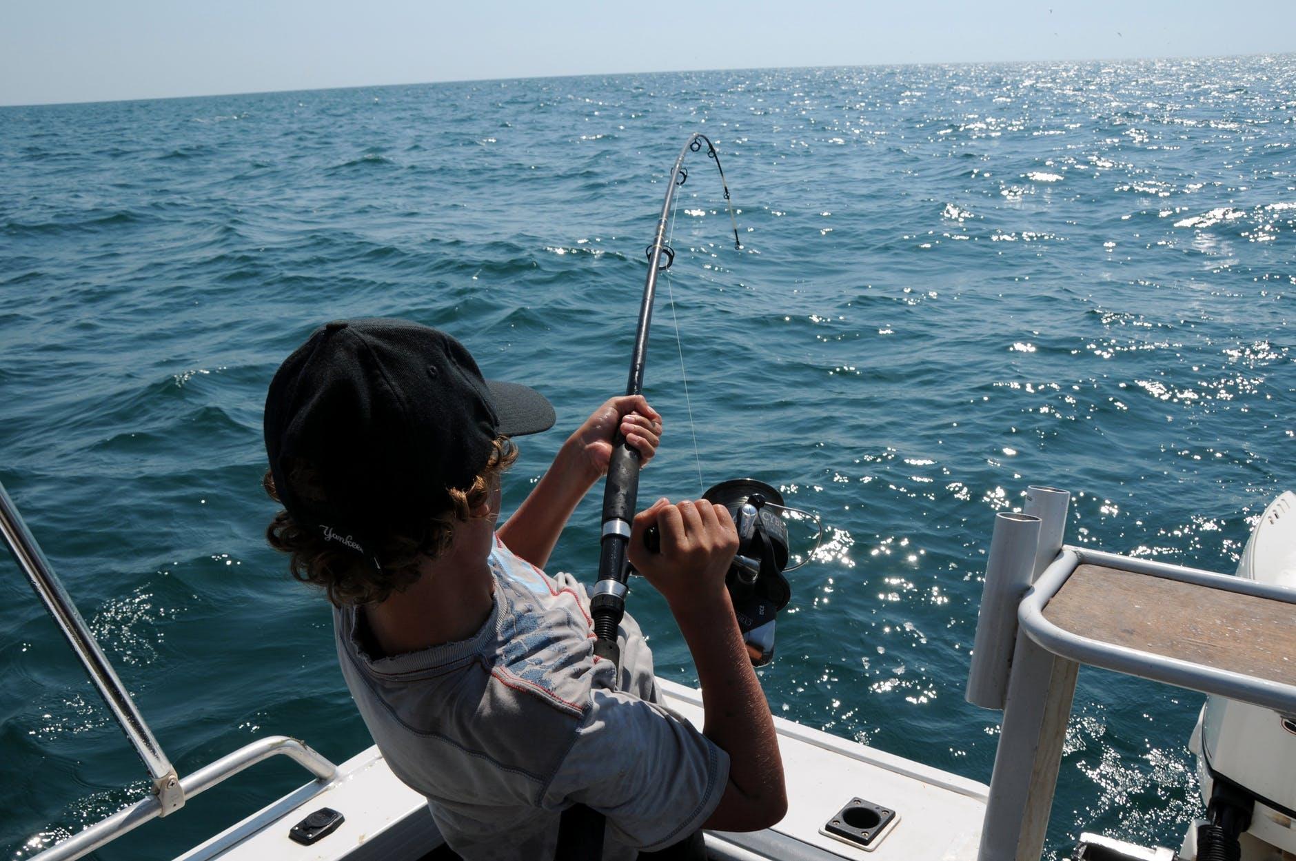 Person fishing using a fishing rod