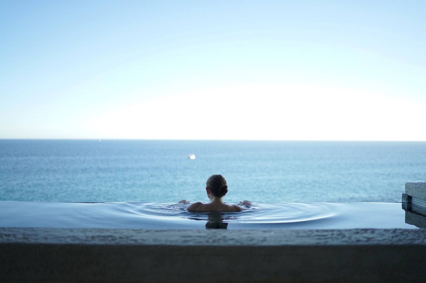 an individual enjoying a beach day in Cabo