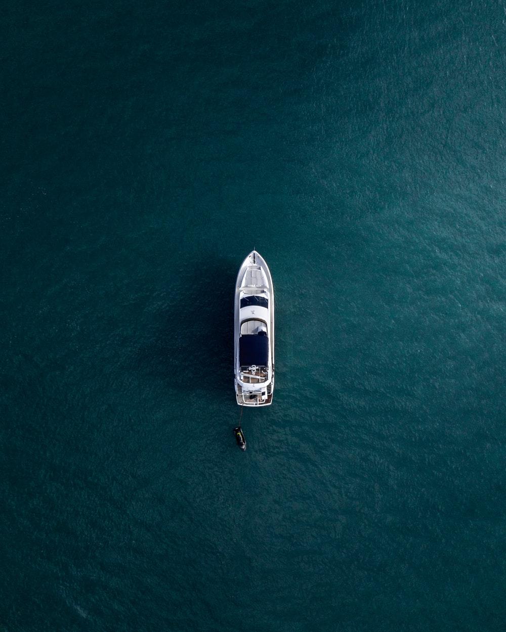 Aerial view of a yacht and a jet ski