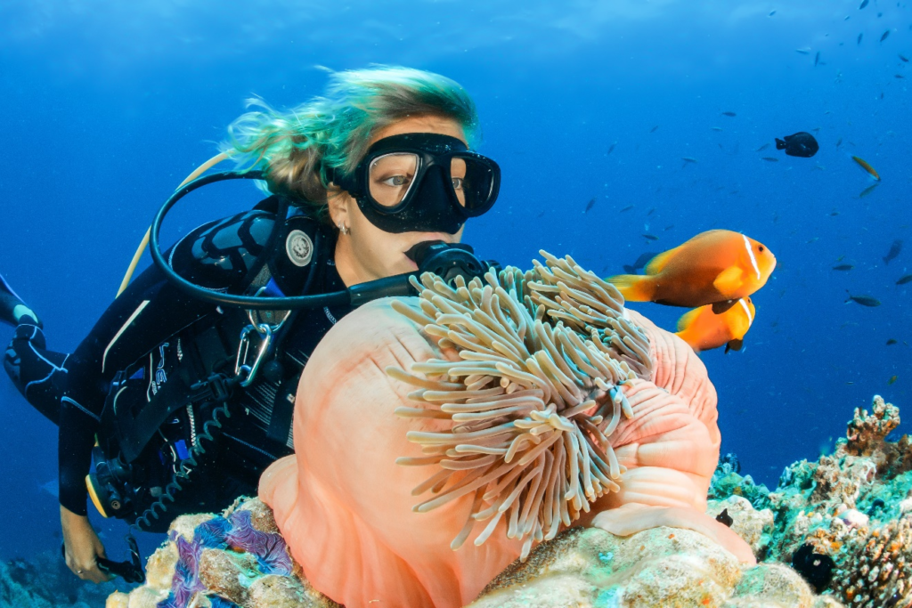 A woman diver swimming underwater